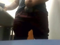 Brazilian Daddy Strokes His Big Uncut Cock at Work