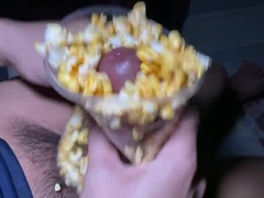 Wank off with popcorn.