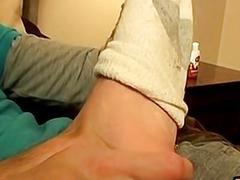Gay studs play with their feet during foreplay before fucking