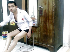 Hot sissy crossdresser femboy Sweet Lollipop teaching Yoga in a nurse uniform.