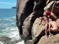 Super-naughty fisherman caught providing his bootie behind the rocks. - UTTER ON CRIMSON