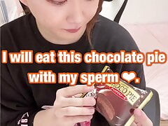 Cute Japanese boy girl eats chocolate pie with her own sperm