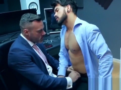 Elegant hunk wears slick blue suit while ramming hot stud