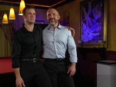 Mature dom flogging muscly submissive