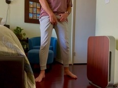 Grey sweatpants, gay showing dick, barefooted