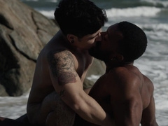 Appealing men fuck by the rocks in outdoor threesome and share great details