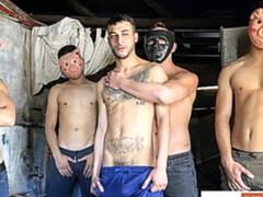 Masked dudes gang-banging a submissive guy