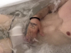 A dude in white underpants took a tub, drained off and jizzed