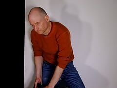 Man strip for you he removes his clothes show his small flaccid uncut penis and big shaved balls wanks till his cock erect