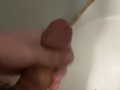 Solo masturbation of a big dick in the shower