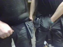 Friends enjoying cock rubbing at work