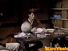 Nerdy college students blow each other in the library