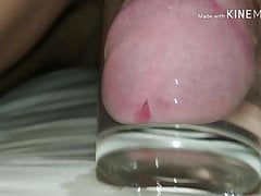Cumming in a glass of water