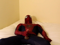 spiderman wanks off and jizzes all over his suit