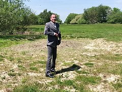 In business suit playing in mud. Part 1