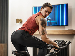 Sporty lads work the bike and each other's ass in a flaming duo