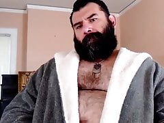 Bearded Bear plays with his nipples and cums