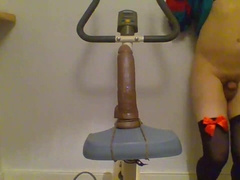 Sissy Rides Dildo on a Bike 2