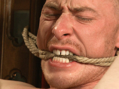 Submissive male sucks his master's cock and endures ruthless bondage kinks
