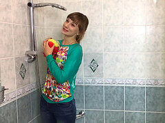 Hot russian chick under the bathroom with totally clothes