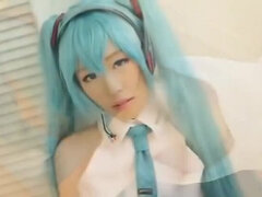 Miku cosplayer masturbates