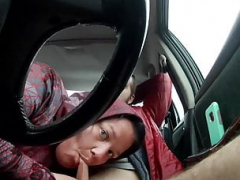 Grown-up prostitute giving blowjob guy off in car, no 2 camera