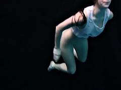 Andreika swims naked in the pool