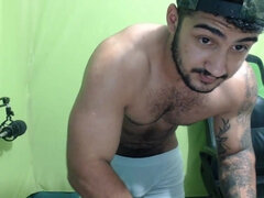 Latina gay guy shakes his long penis online