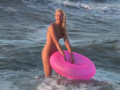 Hot naked blonde on the beach