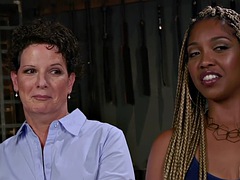 Whipping ebony dyke punishes trapped lesbian with toys