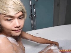 Tranny femboy gives hot blowjob in the bathtub