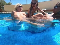Super steamy lesbian fun with a double-ended dildo in the pool