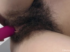 Efina masturbates with her pink vibrator with joy
