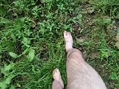 Leaving clothes to cum in the field