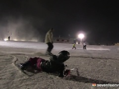 Two winter teens Linda and Lilly kissing