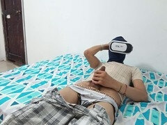 Guy gets off while watching porn in his VR headset