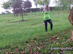 Young kinky teen gets a closeup view of her own pee while getting a relief from nearby park