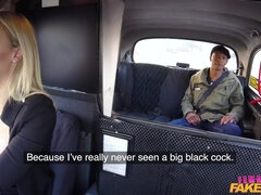 A lady taxi driver works on a big black cock in the backseat