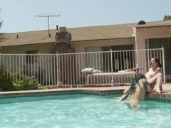 Britanny Lynn and Joanna Angel tease each other in the pool