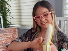 Petite Asian suck banana and big penis