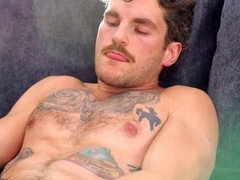 Bad boy hottie Landon gives a long handjob to his uncut manhood