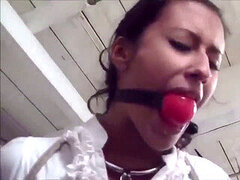 Drea chairtied, balgagged and slobbering