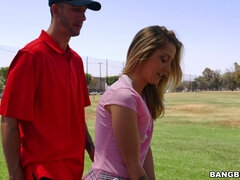 Karla Kush teasing her golf instructor with her short skirt