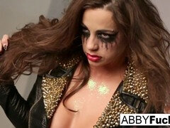 Abigail Mac teases during a photo shoot with a hint of music