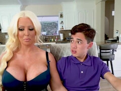 Big boobies stepmother is enjoying his young boner