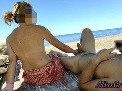 MissCreamy performs bold public handjob on a big cock at nudist beach, ending with a creamy cumshot