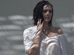 Lauren Cohan modeling in a dripping wet T-shirt with pokie nipples