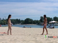 Petite nudist teen enjoys a beautiful day at the beach