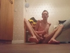 Skinny teen jerks off his huge hard cock on bedroom floor