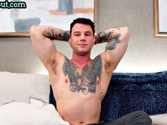 Inked jock masturbates solo on first casting